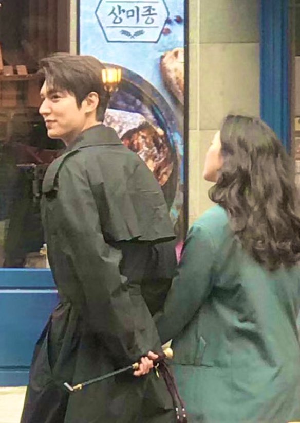 Sunbaenim, why are you smiling like that? ahhh okay i got it! this photo is from their behind the scene, a fan said that after the take... they are still holding hands. so, ahem! what is the meaning of this?  #KimGoEun  #LeeMinHo  #TheKingEternalMonarch