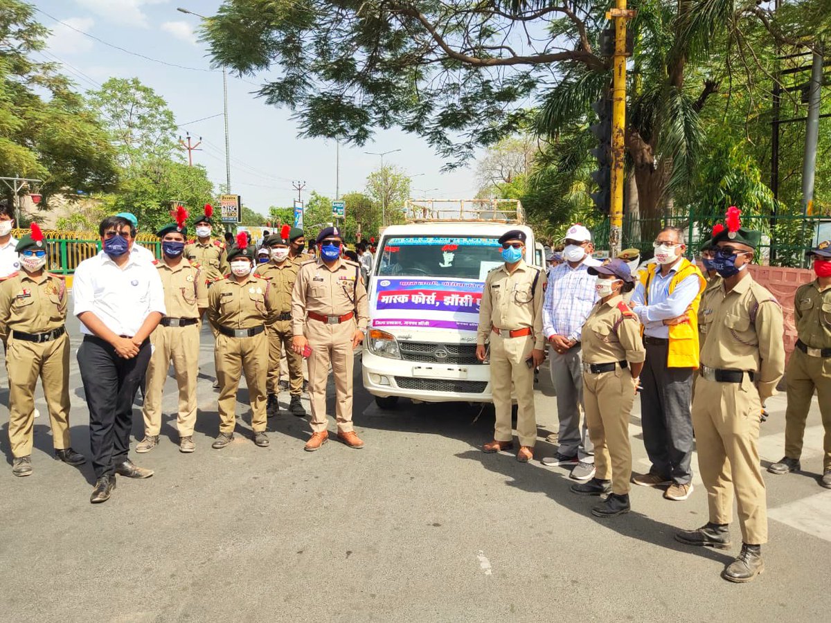upcoprahul's tweet photo. #MaskForce-A joint task force led by @jhansipolice &amp; #CovidWarriors of NCC, NSS &amp; Civil defence to implement wearing of masks, preventing spitting at public places &amp; observance of #Covid protocol. 
It would move around in rural areas to spread awareness-https://t.co/C6W6KNzInz https://t.co/qgeYUL9pjR