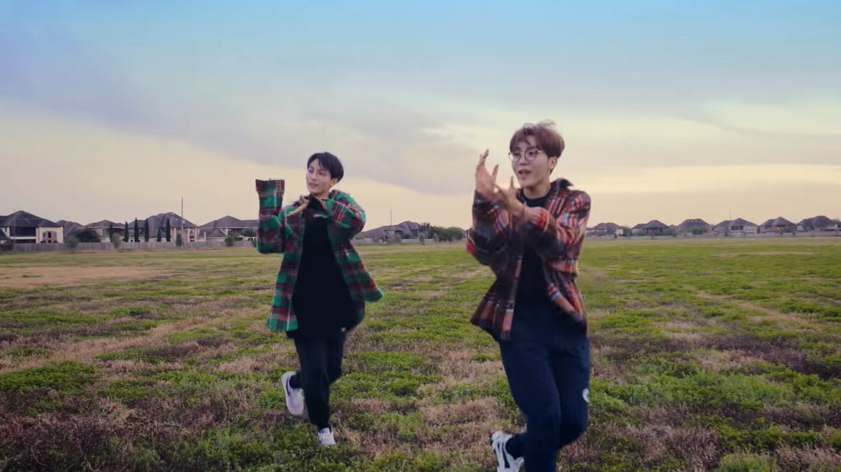  green/brown great combination of green, brown (earth tone & skin tone), & black (from jeonghan's outfit & the hills behind). seungkwan's outfit also has that red + earthly tone, which mixes well with jeonghan's outfit and the surroundings.