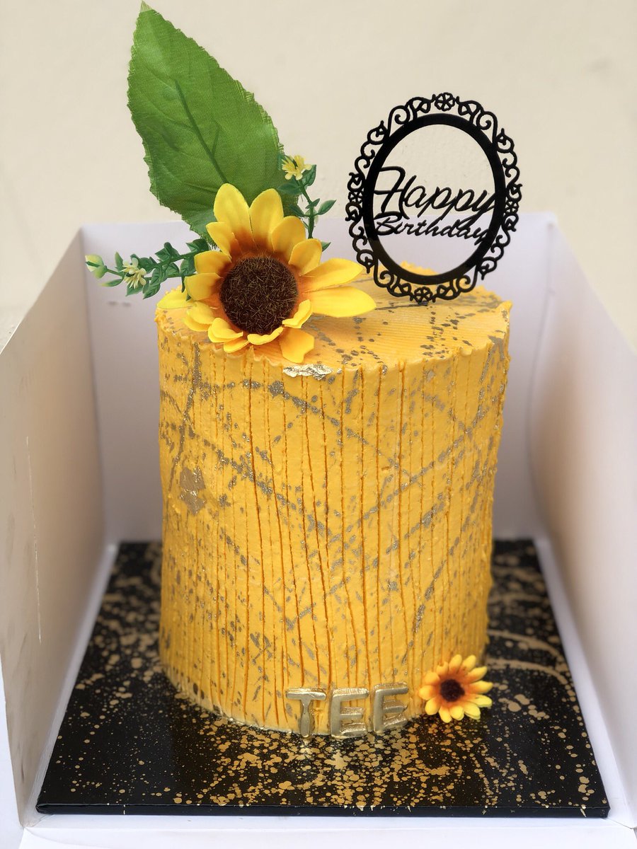 black nikes with sunflower design