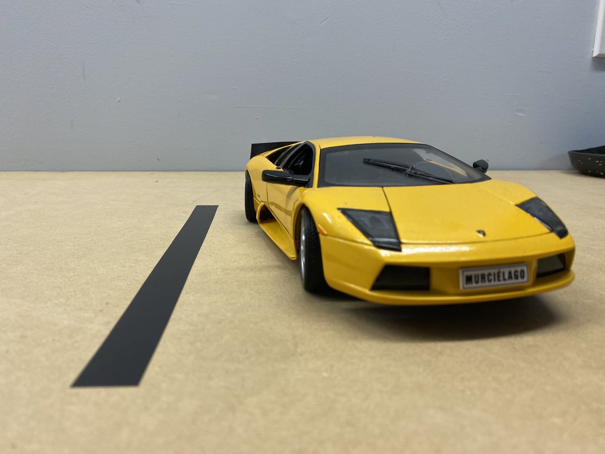 Now a comparison. See the quarter panel and spoiler peeking out?