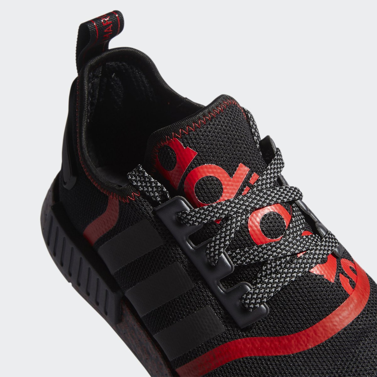 adidas nmd r1 transmission pack core black