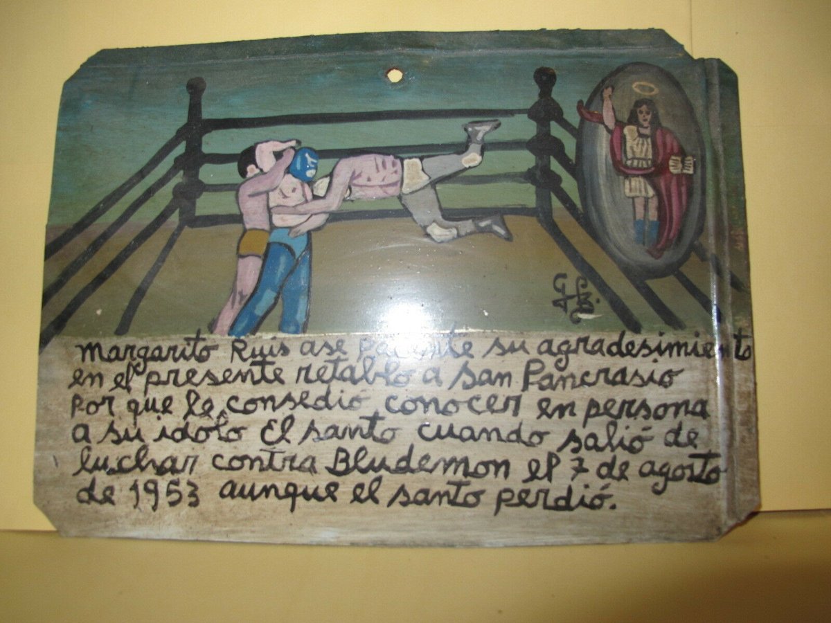 LMFight's tweet photo. Mexican retablo Handpainted on old tin.
Margarito Ruiz makes clear his gratitude in the present reredos to San Pancrasio because he allowed him to meet in person his wrestling idol the Saint when he left to fight against Blue Demon on August 7, 1953, although the saint lost https://t.co/luZcSIRjWR