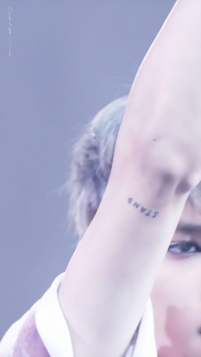 Album name: UNDERSTAND Taeyong has a tattoo on each arm that forms « under - stand ».It means that he wanna understand others and be understood in return.