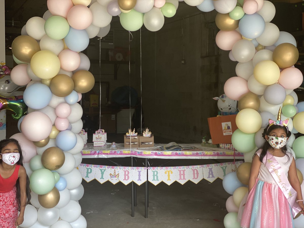 First we asked my daughter to pick a few friends and we asked each to sign up for a 20 min slot. We asked that anyone who came wear a mask, and asked if anyone was having symptoms to pls decline the invite. We decorated our garage and put tape on the ground  #6FtApartAndMasked