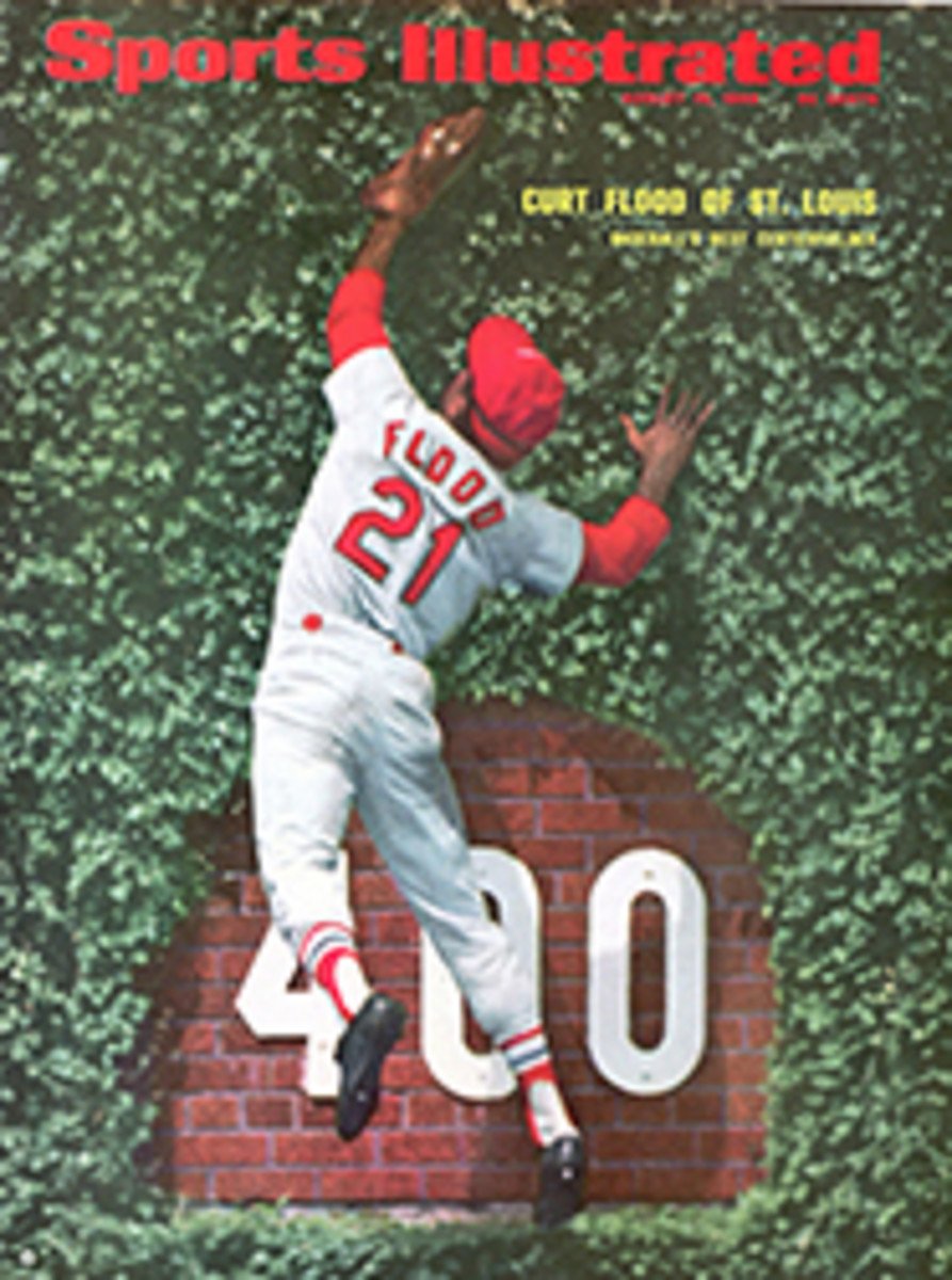 A pair of notable baseball photos snapped by Scharfman: Roger Maris's 61st home run, and Curt Flood making a leaping catch into the ivy at Wrigley Field (SI cover in August 1968)