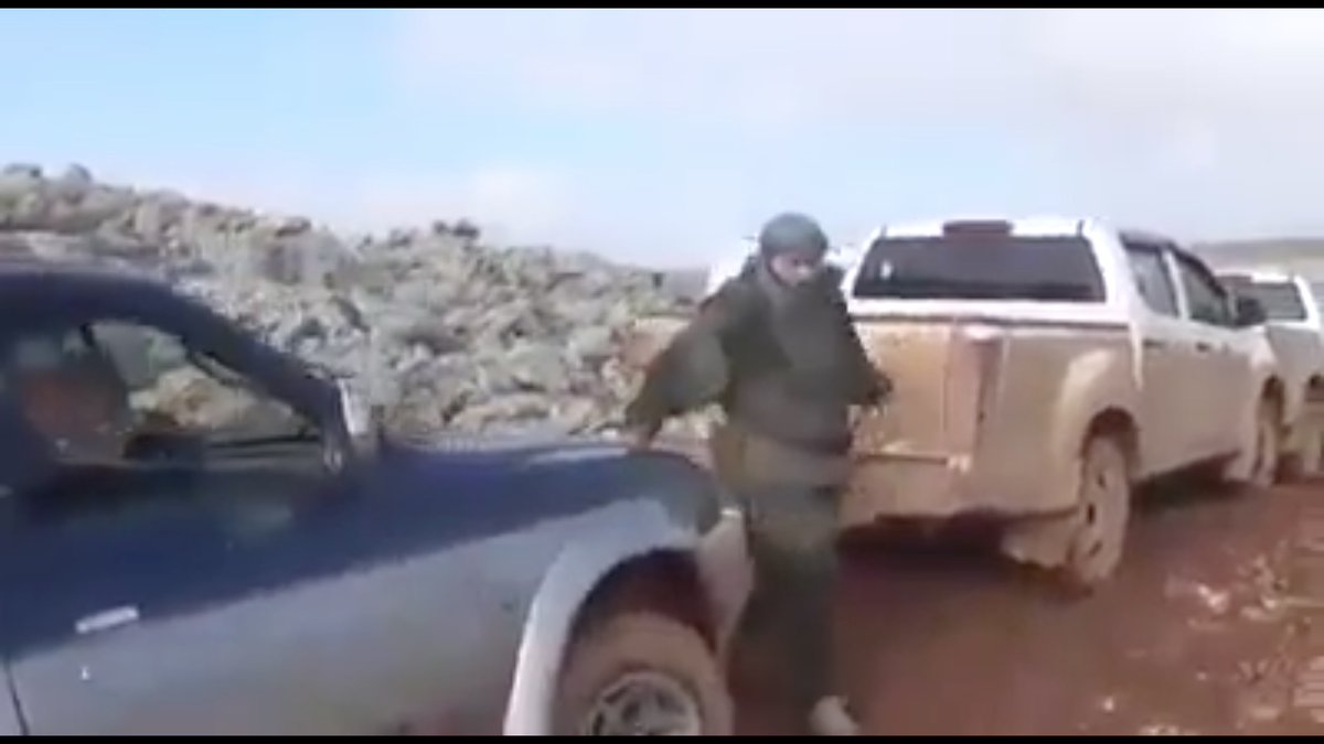 Zenki's desperate flight to Afrin was stopped by air power.Of course there are no known terrorist groups with air power.This man hurriedly ducked away from the camera as the totally intact convoy was being filmed.I have no idea what he's wearing.