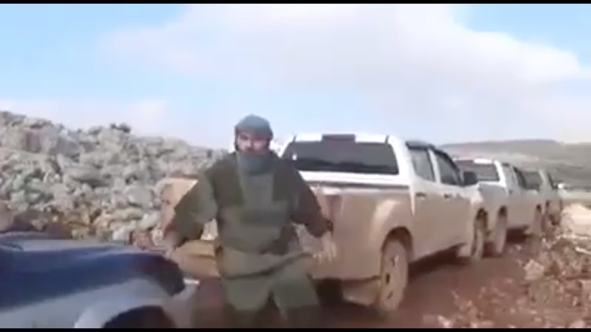 Zenki's desperate flight to Afrin was stopped by air power.Of course there are no known terrorist groups with air power.This man hurriedly ducked away from the camera as the totally intact convoy was being filmed.I have no idea what he's wearing.