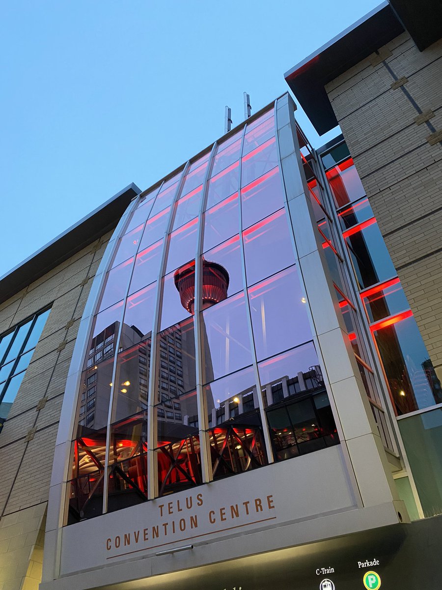 CTCC_Calgary's tweet photo. Tonight, we’re proud to illuminate our Centre in red alongside our partners to celebrate our industry, Calgary’s ultimate hosts and #TourismWeek. @TourismCalgary #LoveYYC https://t.co/VENY4Cd9sg