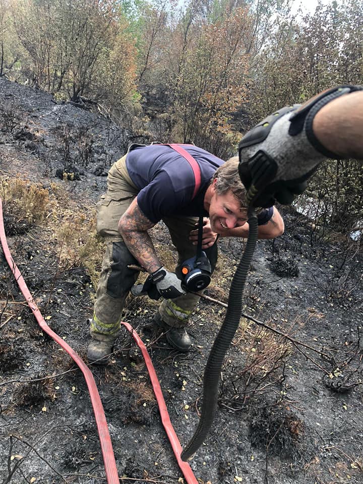 WYFRS's tweet photo. 😱 If you're afraid of snakes then look away now! 🐍

Firefighters from Skelmanthorpe came across an interesting find whilst dealing with a Moorland fire this weekend!

Thanks to some top work, our brilliant crews managed to save the snake from the fire. 👏👏👏

#MondayMorning https://t.co/EvbVduPmyT