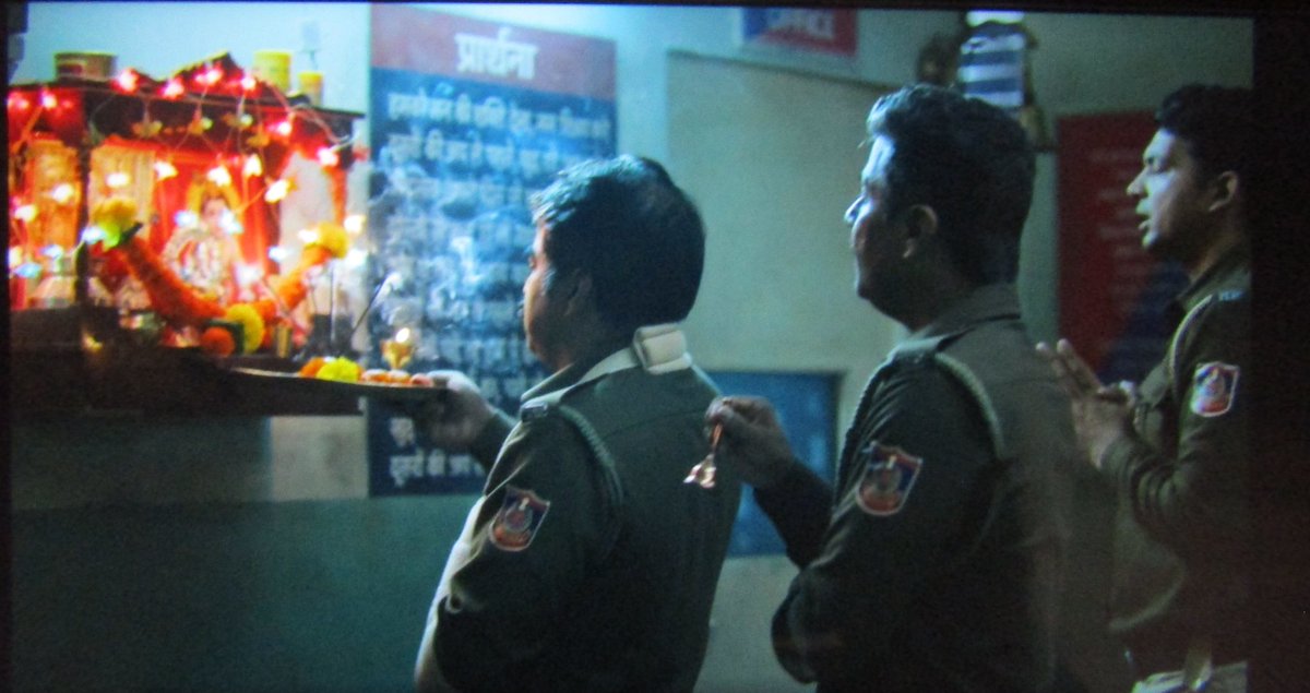 One more scene where some cops are praying to hindu gods and reciting prayers. Same cops pass off hatred for their muslim colleague in another scene. Every devout hindu must be a bigot who's filled with hate for other religions, right?