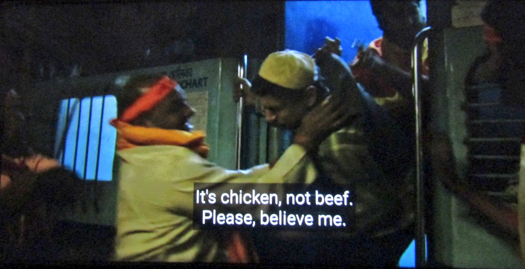 Now, let's meet some Ram bhakts, shall we?Here's a scene where people chanting "mandir wahin banayenge" suddenly find the muslim guy mentioned above eating chicken and lynch his son on the suspicion of eating beef. #RamMandir  #Lynchings  #PatalLok  
