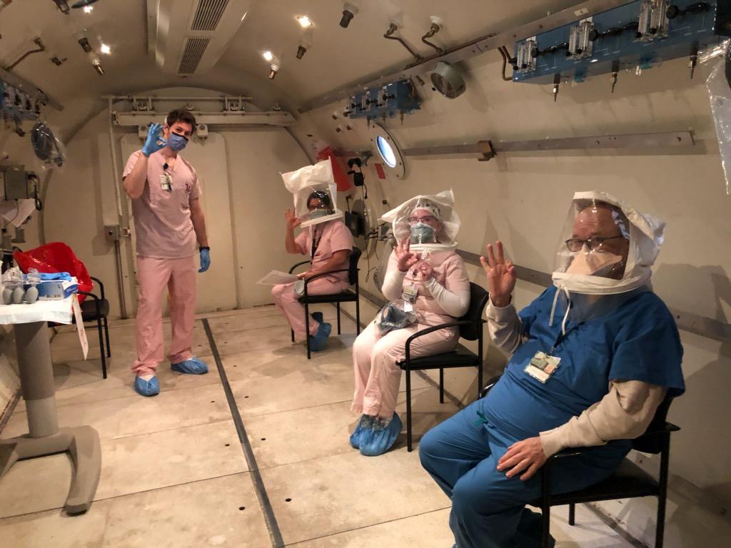 STCHBOT's tweet photo. Fit testing of N95 masks at pressure (33 fsw). Assuring safety of hyperbaric patients and staff during COVID-19 pandemic. @KinjNS @UMBaltimore @johnsonarbor @UMMC @UMEmergencyMed @UMBaltimore @UMmedschool https://t.co/t0CAW83bQW
