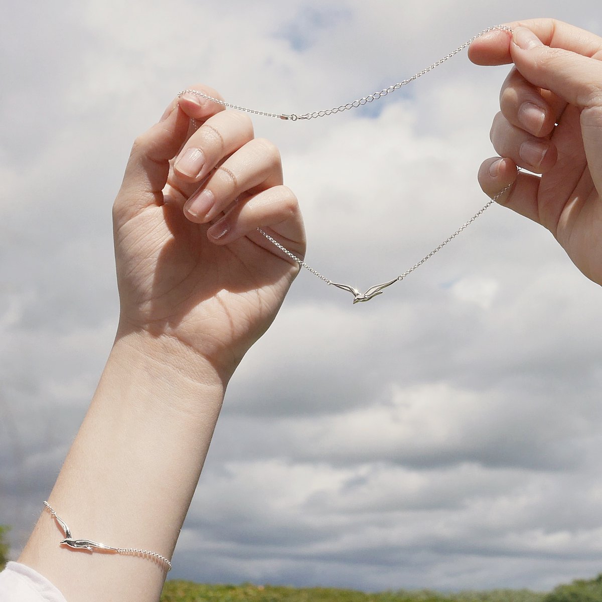 LilyCharmed's tweet photo. Meet our elegantly Soaring bird bracelet &amp; necklace. Maybe it's because we're taking more time to connect with nature in lockdown,  this is a favourite right now. Pretty for any age - why not personalise with a message for a thoughtful gift? #recycledsilver #birdnecklace #flyhigh https://t.co/zNn6MqkY3k