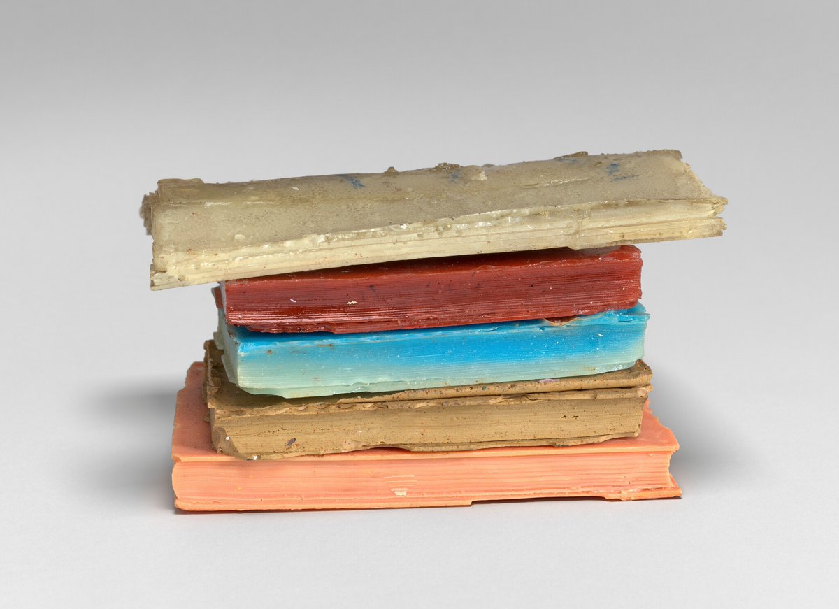 Waitzkin was interested in books as objects. She frequently made resin casts of leather-bound volumes, which she then assembled in small stacks like this one, as well as massive “libraries.”[“Untitled (Stack of Books),” c. 1980]