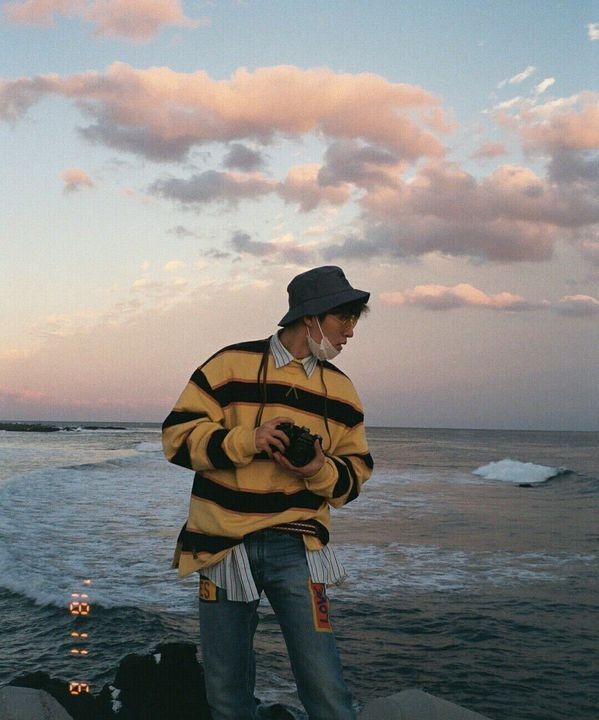 With his f damn cameras.