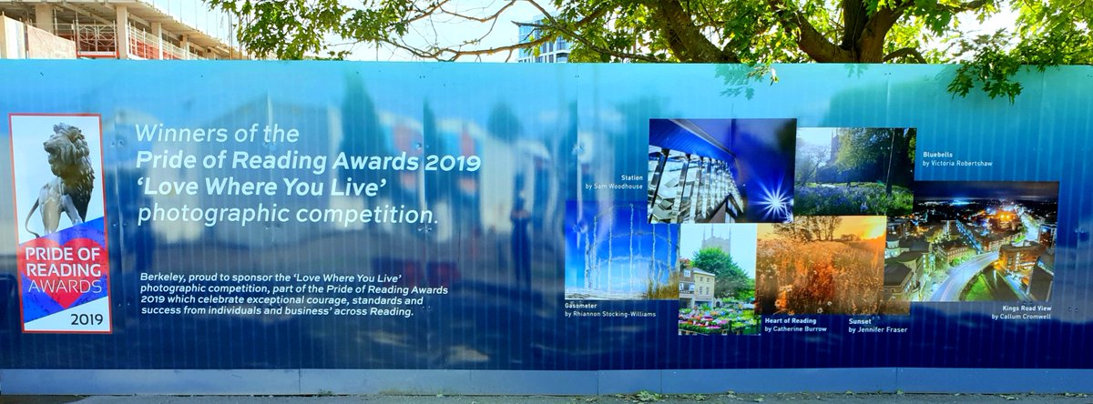 RhiannonLilac's tweet photo. Overjoyed to see my @PORawards Pride of Reading awards photo on the Huntley Wharf hoardings at last! @BerkeleyGroupUK #huntleywharf #gasometer @TowerGas #gastower #Newtown @ReadingRefugees https://t.co/lxyLrpEvBw
