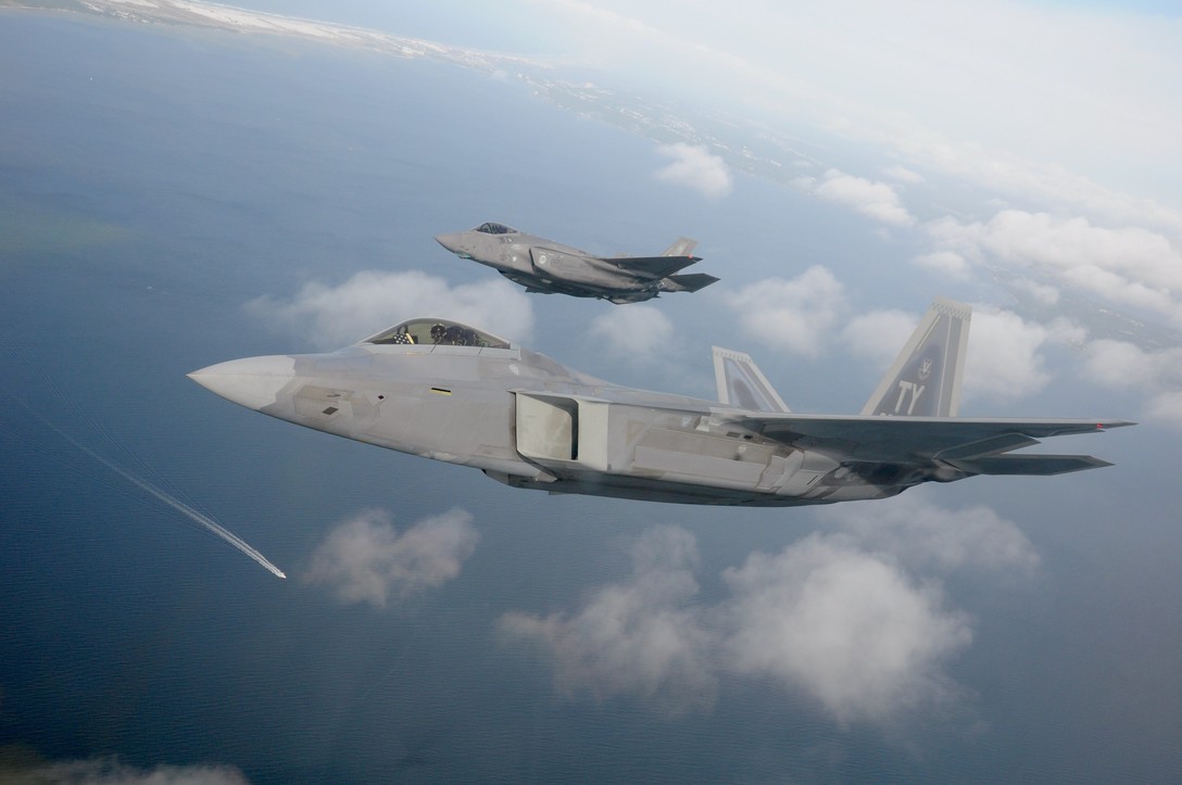 An #F22 from the 325FW flies next to a #F35 from @TeamEglin over the Emerald Coast --nationwide flyover saluting healthcare workers, first responders, essential employees #InspireAF #USAF #AmericaStrong @TeamTyndall @usairforce @CityOfFWB @USAF_ACC