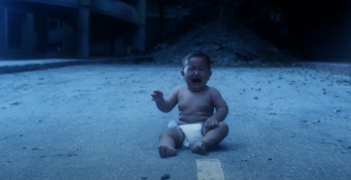 Then is the heartbreak. A baby crying in the middle of a road (traffic = trafficking?).  #ThesePeopleAreSick