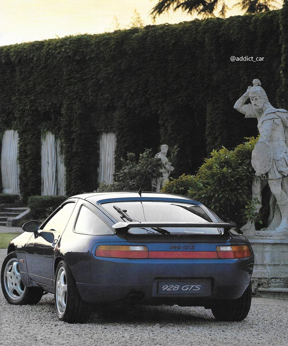 The 1992 GTS was the last evolution of the uniquely-styled Porsche 928, then nearly 15 years old. It looked more muscular, with flared rear wheel arches, new wheels and mirrors. The 5.4 litre engine was more powerful and airbags appeared for the first time. #carbrochure #Porsche