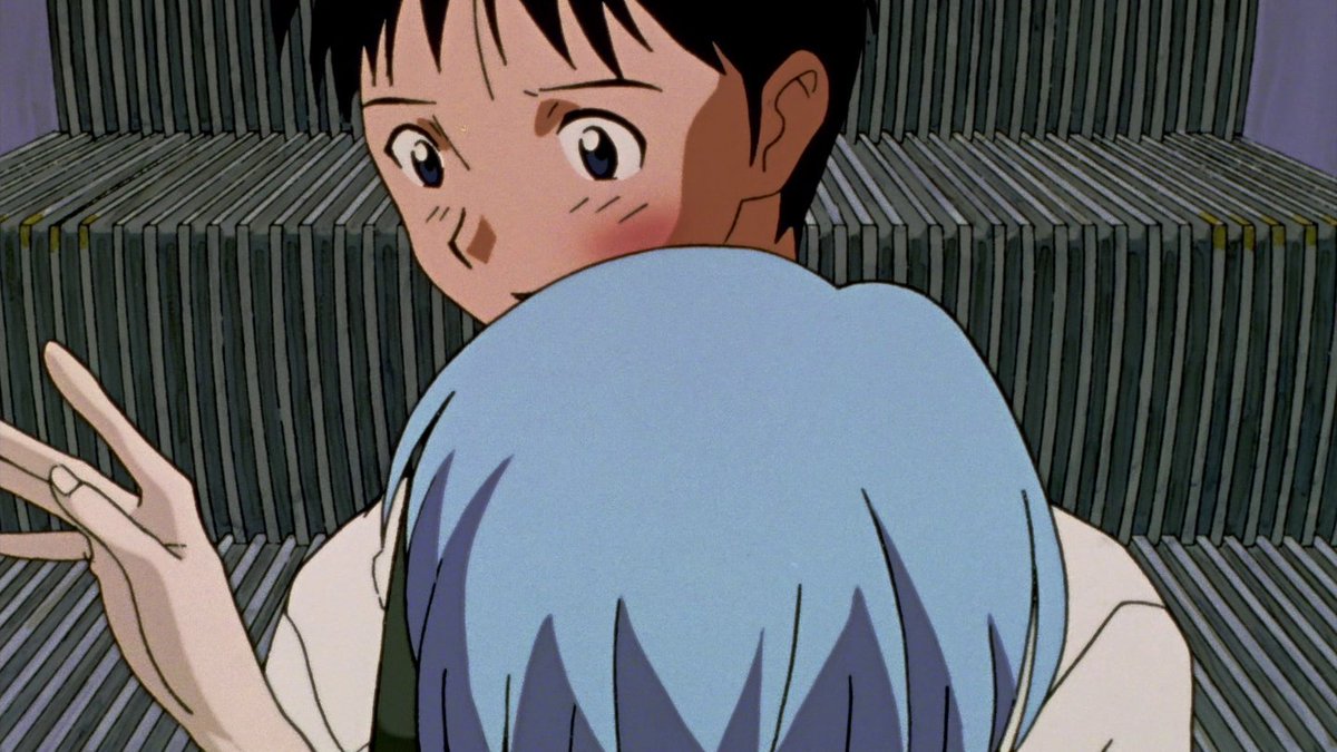 [sidebar: we see rei's anger early on. shinji's attitude toward gendo causes rei to slap him. this is rei's 1st time hearing someone undermine gendo-- her creator and totalizing+godlike force in her life. note her use of 'faith' vs shinji's 'trust'.]
