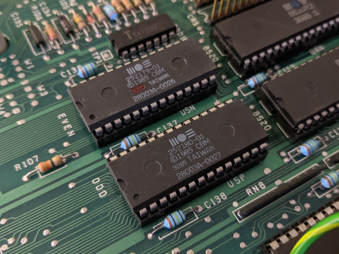 so if the Amiga 1000 had no ROM and had this WCS board instead, how did it show the boot screen asking for the kickstart disk? it used this internal 8K ROM set for that. most of it was filled with the picture of the hand with the floppy disk!