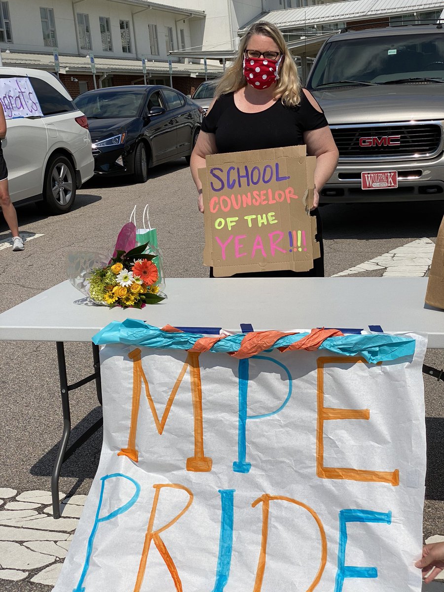 MillsParkElem's tweet photo. We are very proud of Nancy Stavrakakis, our WCPSS counselor of the year!!! We celebrated her with a parade and signs.  We love you, @CounselorStav!!!! ❤️ https://t.co/BTtvtk17nE
