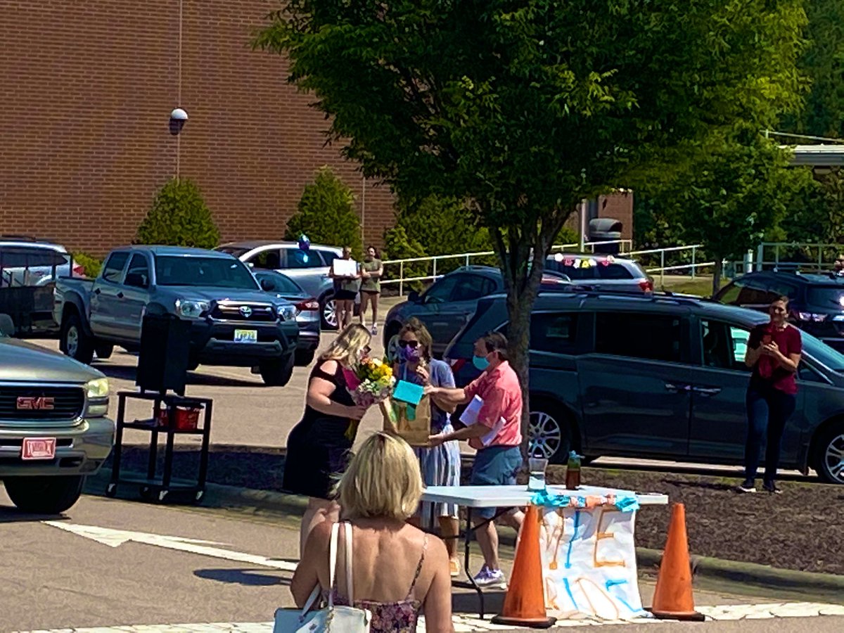 MillsParkElem's tweet photo. We are very proud of Nancy Stavrakakis, our WCPSS counselor of the year!!! We celebrated her with a parade and signs.  We love you, @CounselorStav!!!! ❤️ https://t.co/BTtvtk17nE