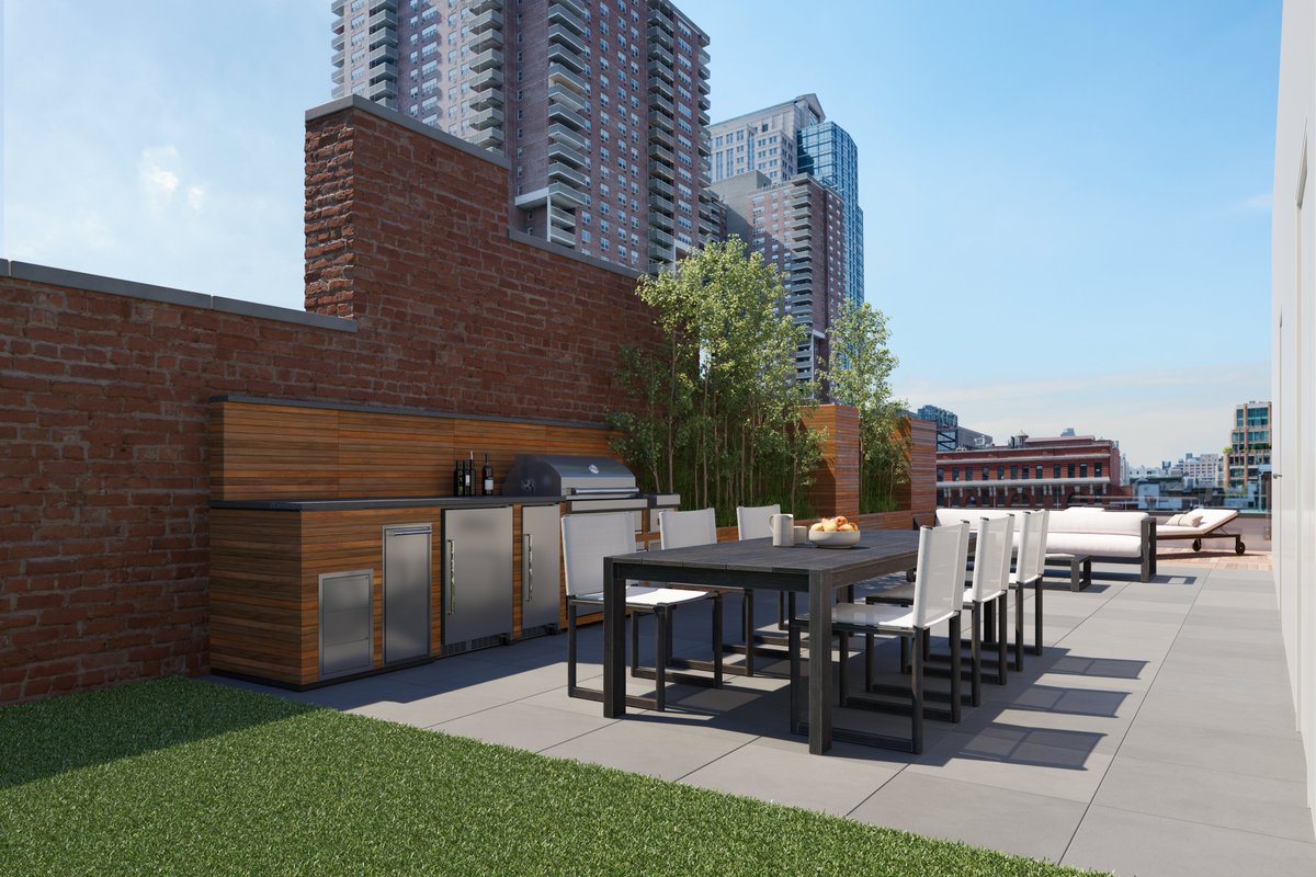As outdoor living takes on a large part of our lives this summer outdoor kitchens will be become more popular. This full rooftop kitchen is just one of three outdoor spaces of the penthouse at Meshberg Group designed 15 Jay. #coronavirus #designthinking #nyc