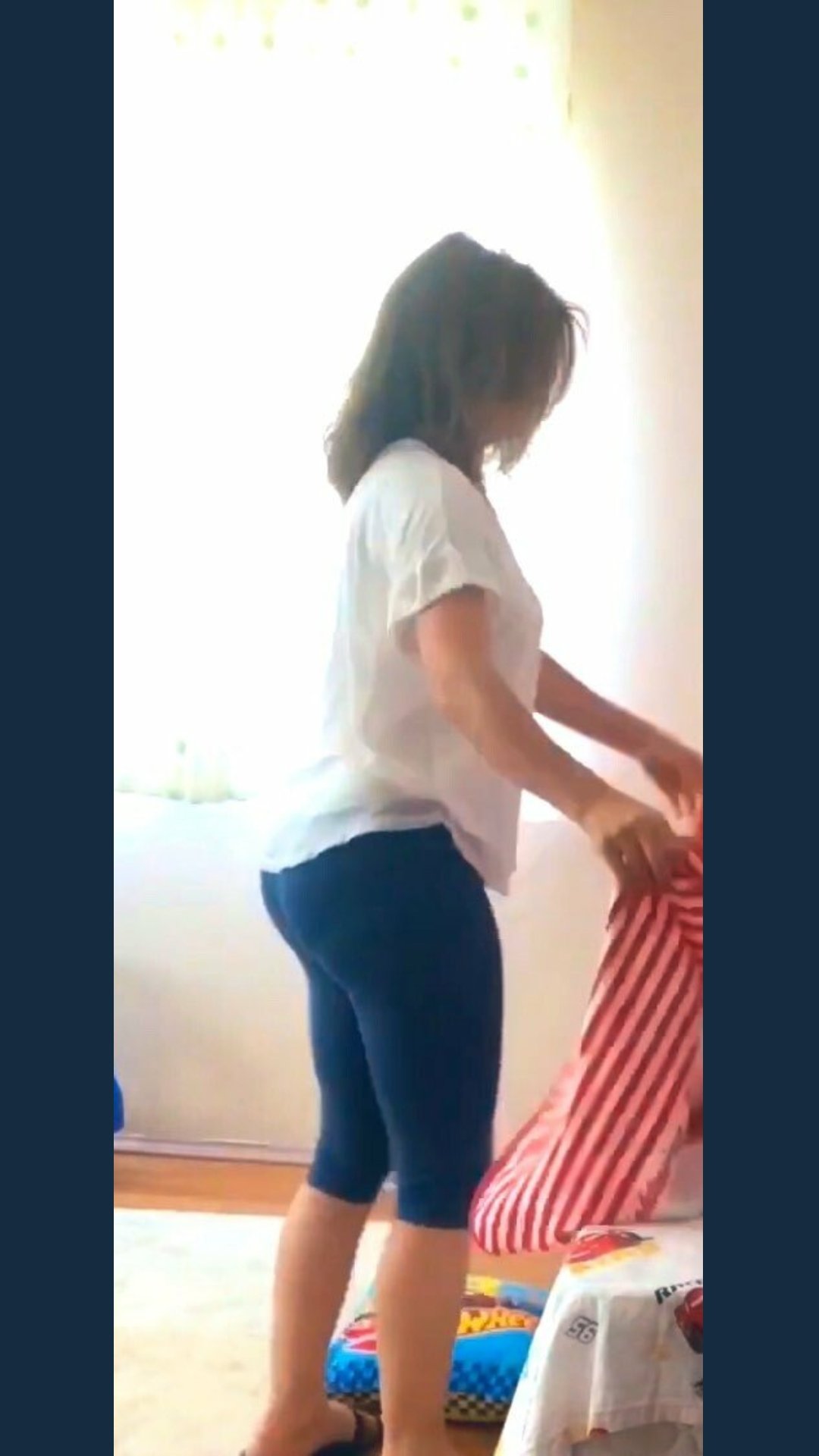 A woman in a suggestive pose