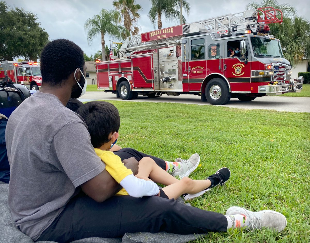 DelrayBeachFire's tweet photo. We love making new friends...even if it's at a distance. DBFR was very happy to take part in Keller Williams' Red Day charity event today at a local group home for boys. #DelrayStrong #happykidshappycity https://t.co/TQPoD1qrEX