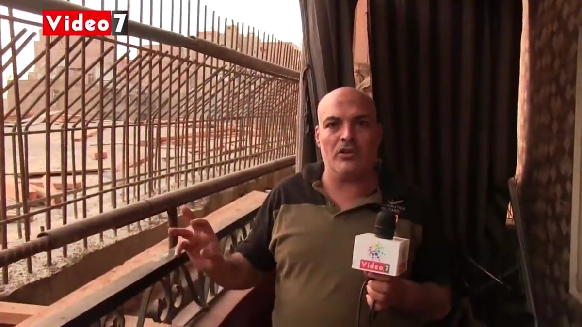 KarlreMarks's tweet photo. This is incredible, they built this bridge right by those buildings in Egypt. You can reach out and touch it from the balconies. https://t.co/lzfoZ5beAa