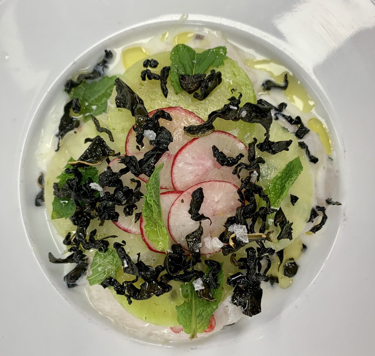 Scallop “Ceviche” yoghurt , pepperberries,mint, radish , crisp seaweed #cliffheatathome