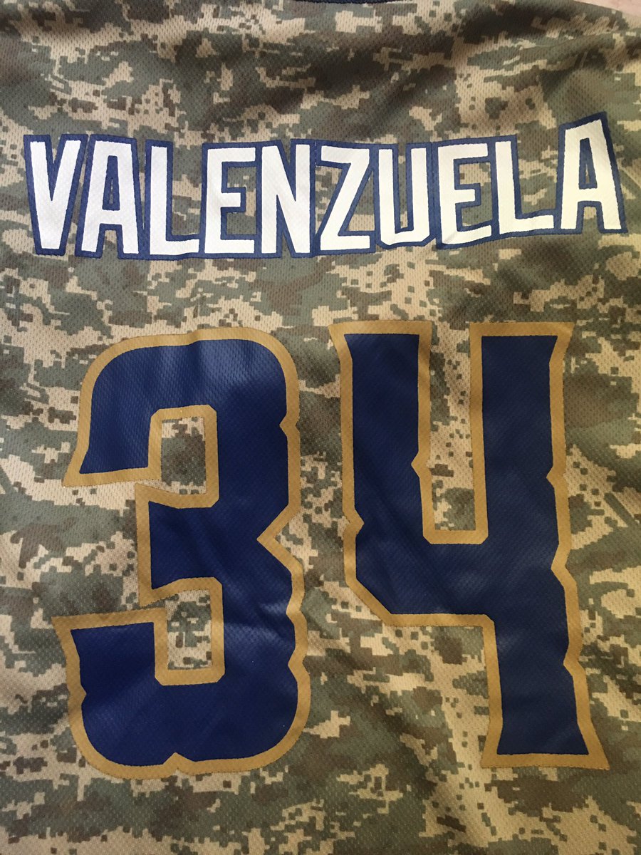 RussSolis79's tweet photo. I don’t watch much MLB anymore but I do support my local team. We are the AAA affiliate of the Brewers. I got this sweet Fernando Valenzuela jersey today. He played here in San Antonio in 1980. Right before “Fernandomania” started. #DefendTheWolff #NeverSurrender https://t.co/vsFf80l0Gt