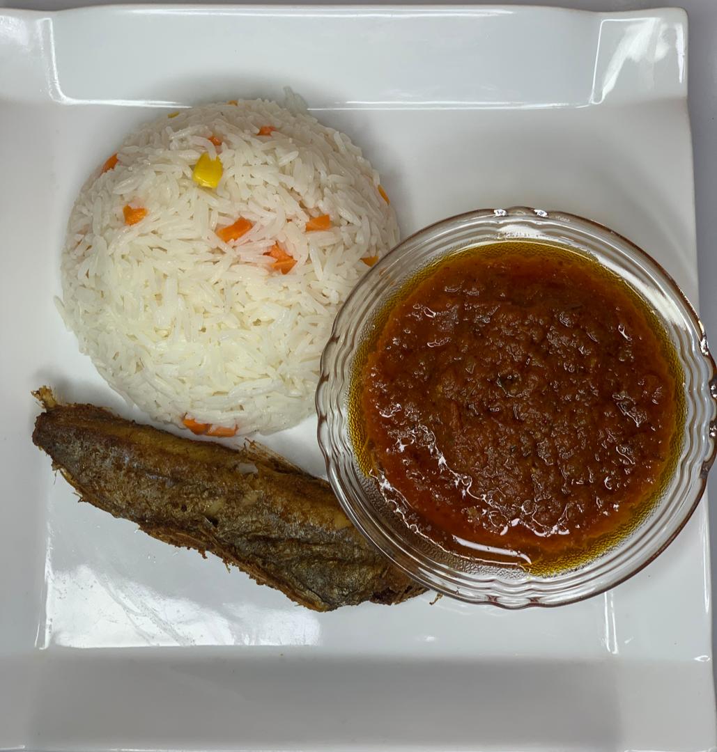 Day 20: White rice, kpanla fish and stew. Watermelon