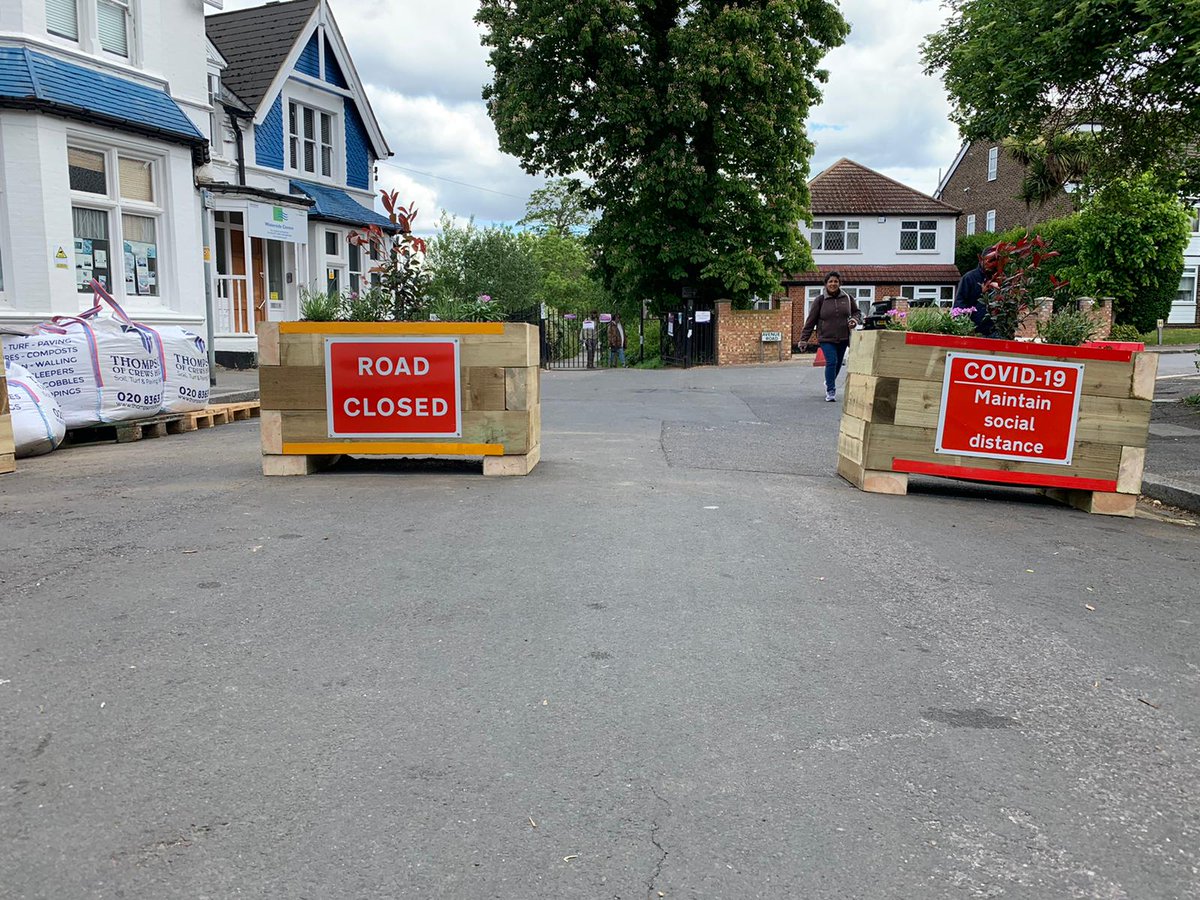 Stuart_King's tweet photo. Planters now in place at most of our road closure locations - final ones due in over weekend.  Thanks to our supplier for working flat out to make them.  These are sporting the new DFT signage.  #CroydonTogether #StreetspaceLDN https://t.co/pr9yMto4JE