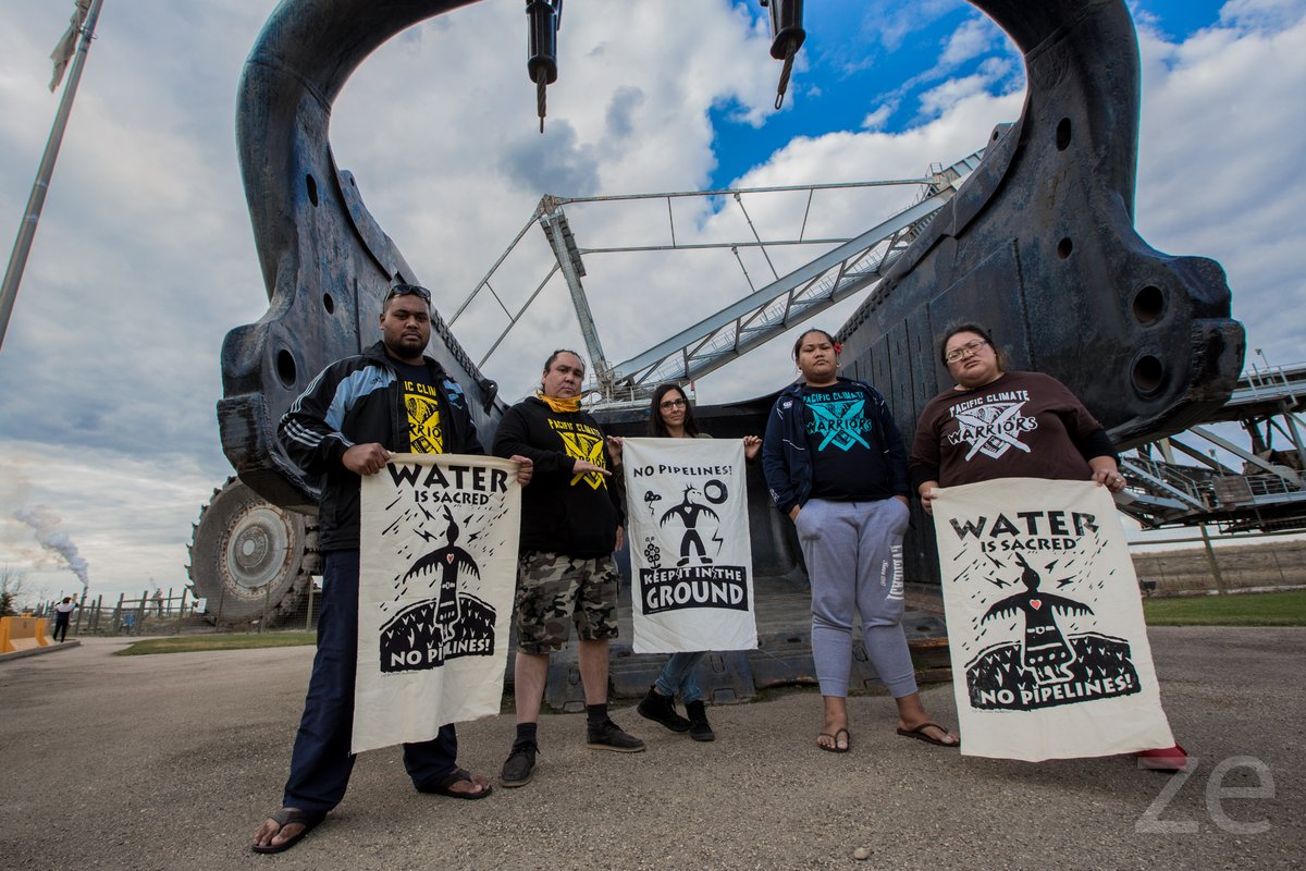 350Canada's tweet photo. #ThrowbackThursday: Three years ago, Pacific Climate Warriors and our colleagues from @350Pacific traveled all the way to Northern Canada to bear witness to Canada's tar sands. #RaiseAPaddle https://t.co/d0qbmjlajz