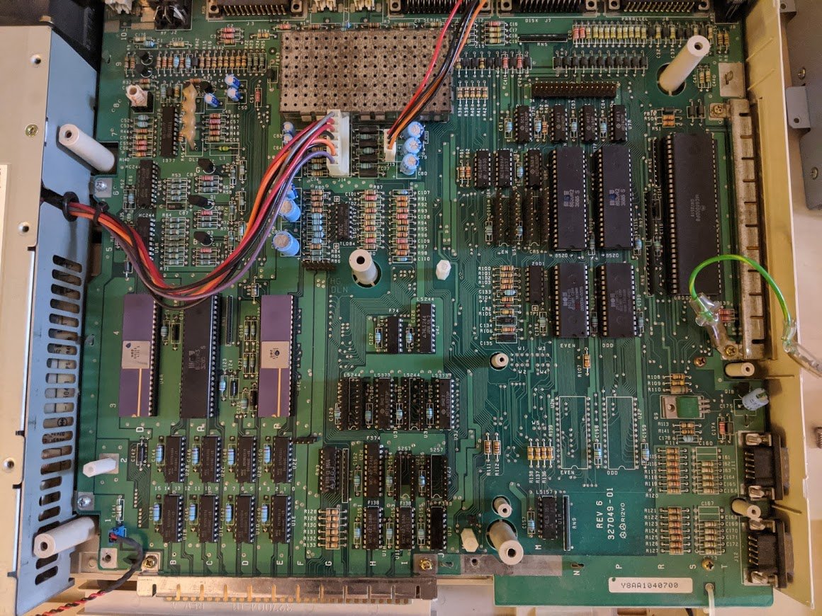 OK, you can see the 8 RAM chips in the lower left corner. they are 64K nibbles (4 bits) each for a total of 256K. but where is the secret RAM?