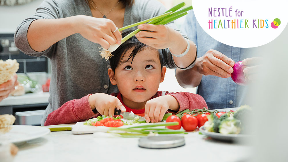 Nestle's tweet photo. Did you know that kids involved in the preparation and cooking of meals are more likely to develop healthy habits in life? Get the full story here: https://t.co/Ty6SmDBhF2 #HealthierKids #DayOfFamilies https://t.co/N9AMHQoitv