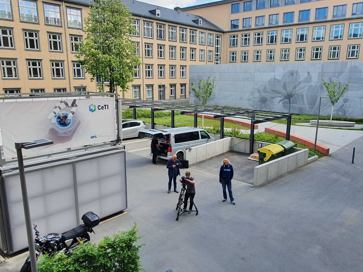 TactileInternet's tweet photo. Today MDR film shooting at CeTI outdoors with Prof. Shu-Chen Li and Prof. Frank Fitzek @tudresden_de @dfg_public @frankfitzek @ShuchenTwit #TactileInternet @ComNets_TUD @Li_Lab_TUD https://t.co/ewjVdnTeRM