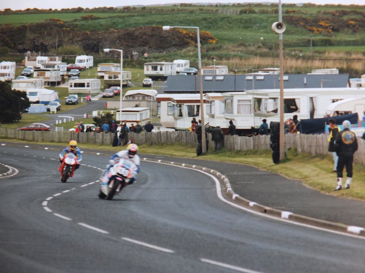 JohnJohnm53's tweet photo. Looking back to the 1996 North West and a blurry pic of Ricky Mitchell with D.Cahill? behind .. got some poor fotos over the years but still glad I never dumped them!   #roadracers #roadracing #NorthWest200 #northwestweek https://t.co/Z8dahinmIc