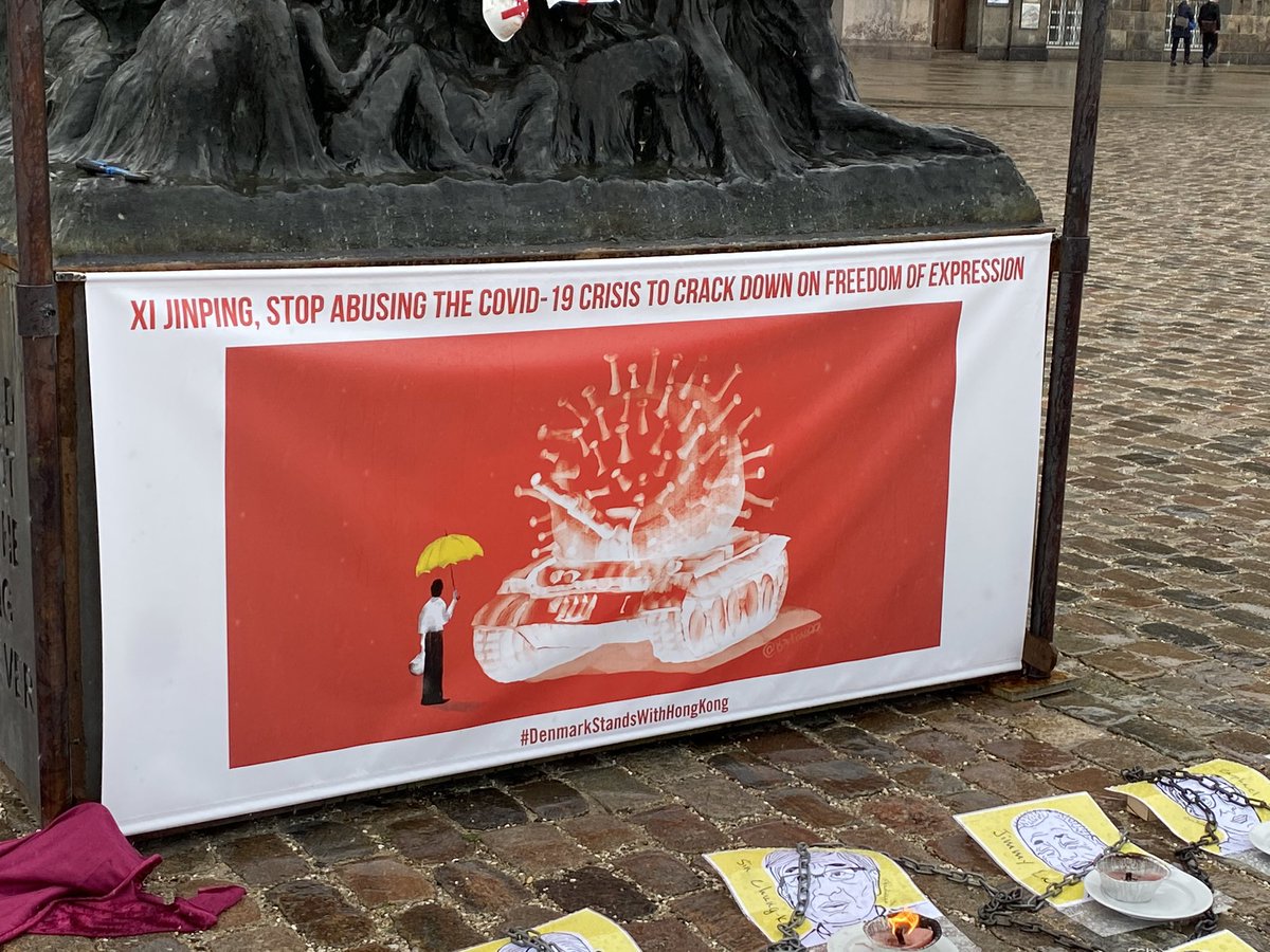 uffeelbaek's tweet photo. What a great rainy democratic morning here in Copenhagen: The world premier of the new artwork of @badiucaoartshop in front of the Danish Parliament. Together with @amnestydk, @Galschiot and myself we organized a public event. Why? Because we still #StandWithHongKong #dkpol https://t.co/pQVzaISJGv