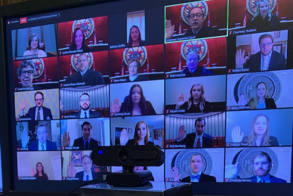 judgewomack's tweet photo. The Arkansas Supreme Court held our swearing in ceremony for newly licensed attorneys this morning through a Zoom video conference.  Yesterday we held our first oral argument by Zoom.

#arpx 
#appellatetwitter 
#SCOAR https://t.co/Zobn5FvZI4