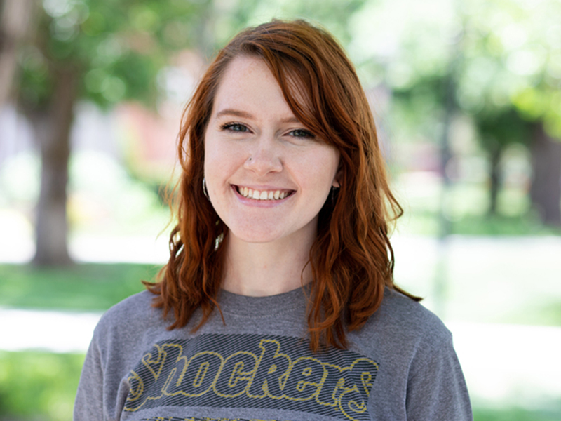 WichitaState's tweet photo. Rhian Cunningham is as creative as they come. With her constant doodles and calligraphy, her personality shines through. She is an intern in the Office of Strategic Communications, where she gains hands-on experience in graphic design. 🎓🌾

Read more 👉🏻 https://t.co/hNe5Y8AXvb https://t.co/spSO1plDJ2