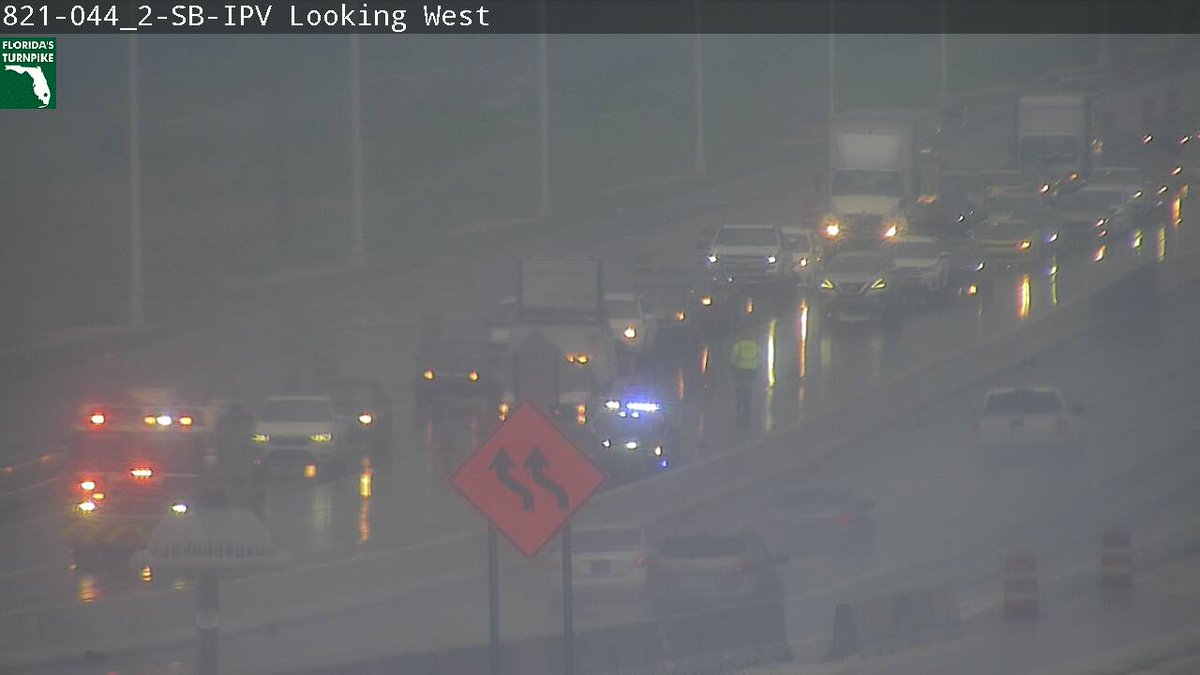 RenoGrant's tweet photo. Heavy rain along the Turnpike near the Dade/Broward line! Plus a crash NB Turnpike past Red Rd blocking the left lane. One right lane gets by. @wsvn @TotalTrafficMIA https://t.co/y5aaxyWzT3