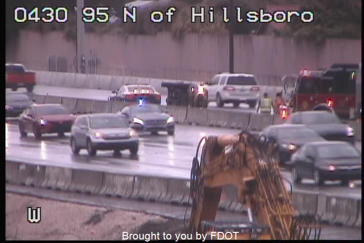 RenoGrant's tweet photo. Deerfield Beach drivers! A rollover crash NB 95 past Hillsboro Blvd blocking two left lanes. Remember to slow down in the rain! @wsvn @TotalTrafficMIA https://t.co/BkcMeIEYGt