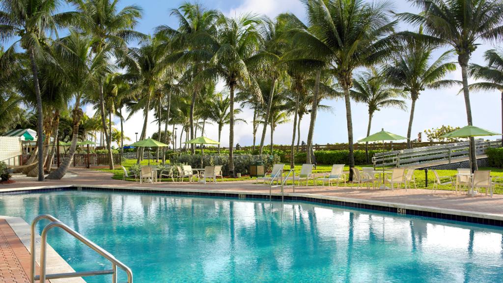 IHGhotels's tweet photo. We're celebrating #InternationalDayOfFamilies the best way we know how: with our family of 16 brands around the world. From architectural history in Amsterdam to poolside sunshine in Miami, our family will be ready to welcome yours when the time is right. https://t.co/Q0dH9ZMSzb