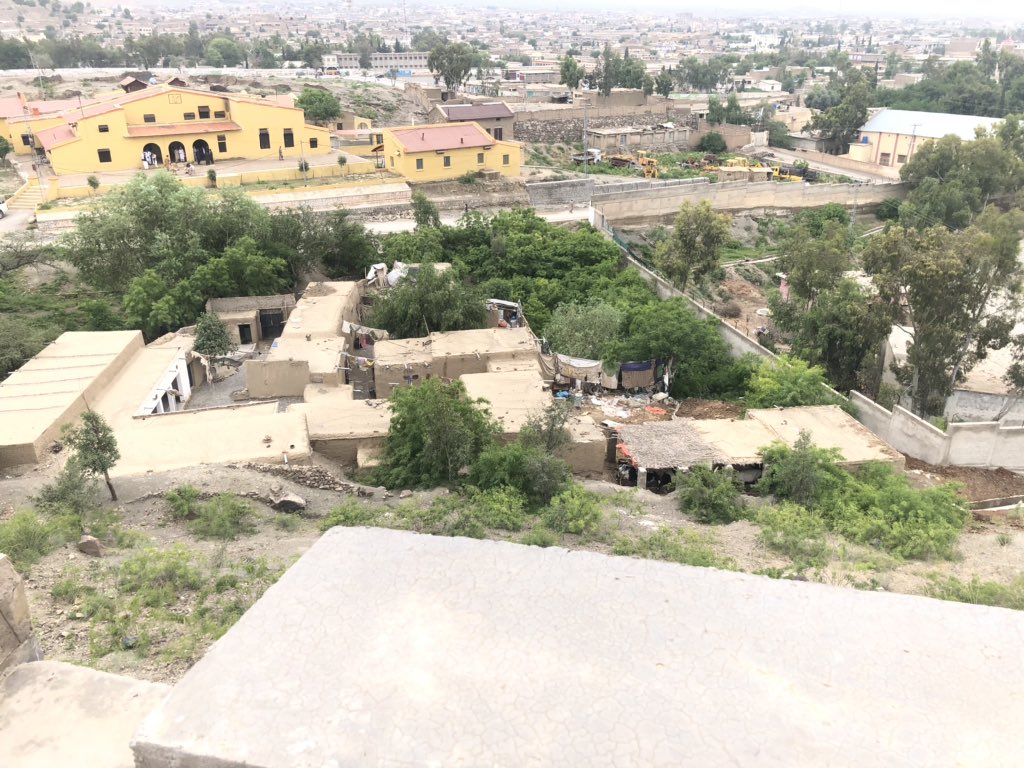 DCKhiCentral's tweet photo. This was a massive encroachment just at bedrock of the #FortSandeman. Alhamdulillah the encroachment is removed & land recaptured. This has turned into a colony with more than 50 persons living there, a working dairy form and luggage that took more than 20 trucks to transport. https://t.co/o43NIXszaE