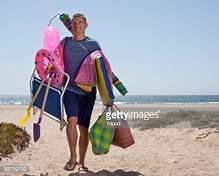 TheMatriarchK's tweet photo. Let's see if I can find where I stashed my beach boi, ya know the sort that carries my beach chair and gear, rubs lotion on my back, holds an umbrella when I need it, run to fetch me something to eat from the beach restaurant, that one, I put him in storage somewhere. https://t.co/WQNebSq3Sv