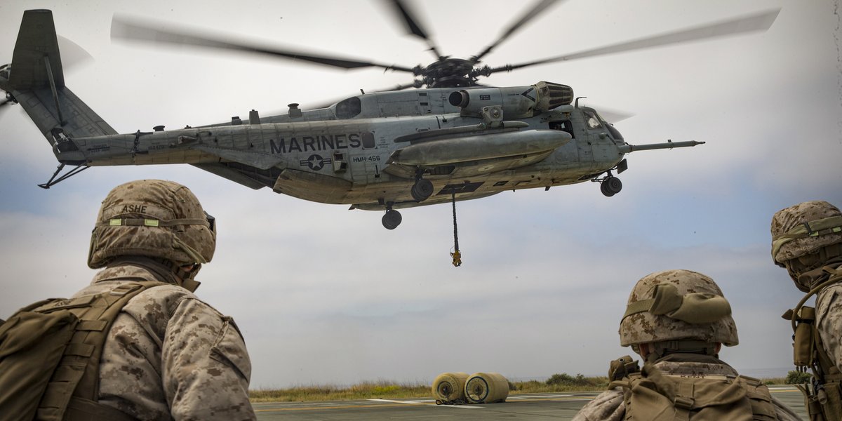 USMC's tweet photo. Our Ride is Here

Marines with Combat Logistics Battalion 15, @15thMEUOfficial, wait for a CH-53E Super Stallion to clear cargo during helicopter support team training at @MCIWPendletonCA. HSTs enable combined logistics and contingency operations. https://t.co/puPHHTWqK9